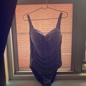 Navy blue 1 piece swimsuit from Macy’s.